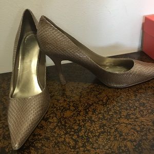 Snakeskin pumps